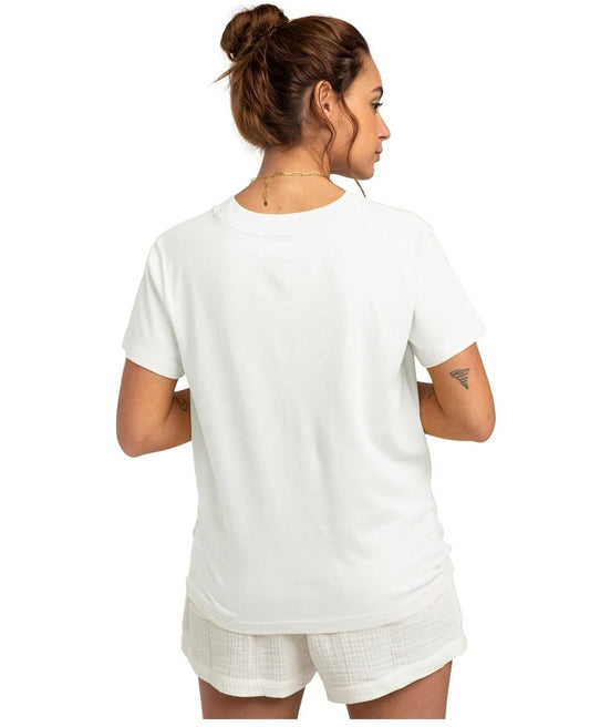 Woman wearing a white t-shirt and shorts set on a white background