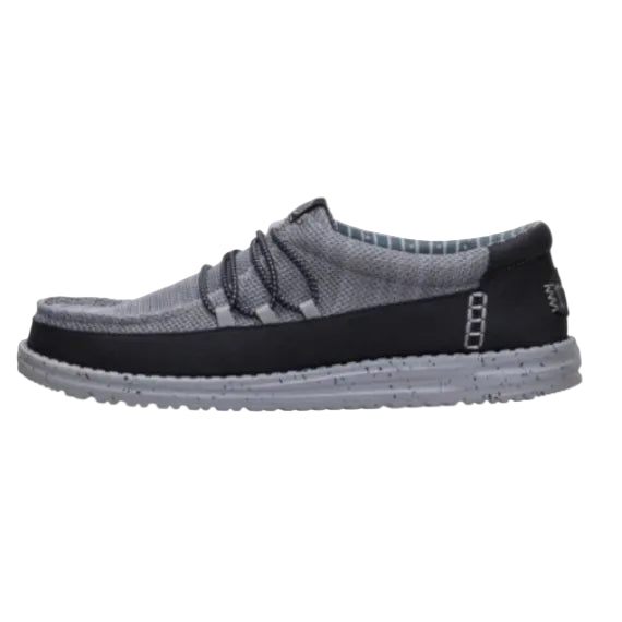 Gray and black slip-on shoe on a white background