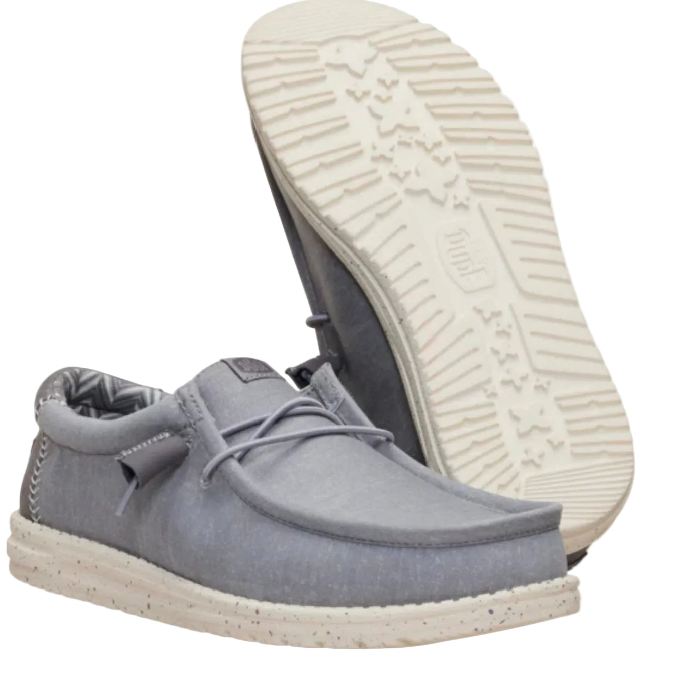 Gray shoe with white sole on a white background