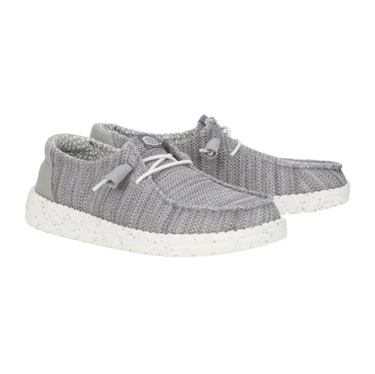 Gray sneakers with white soles on a white background