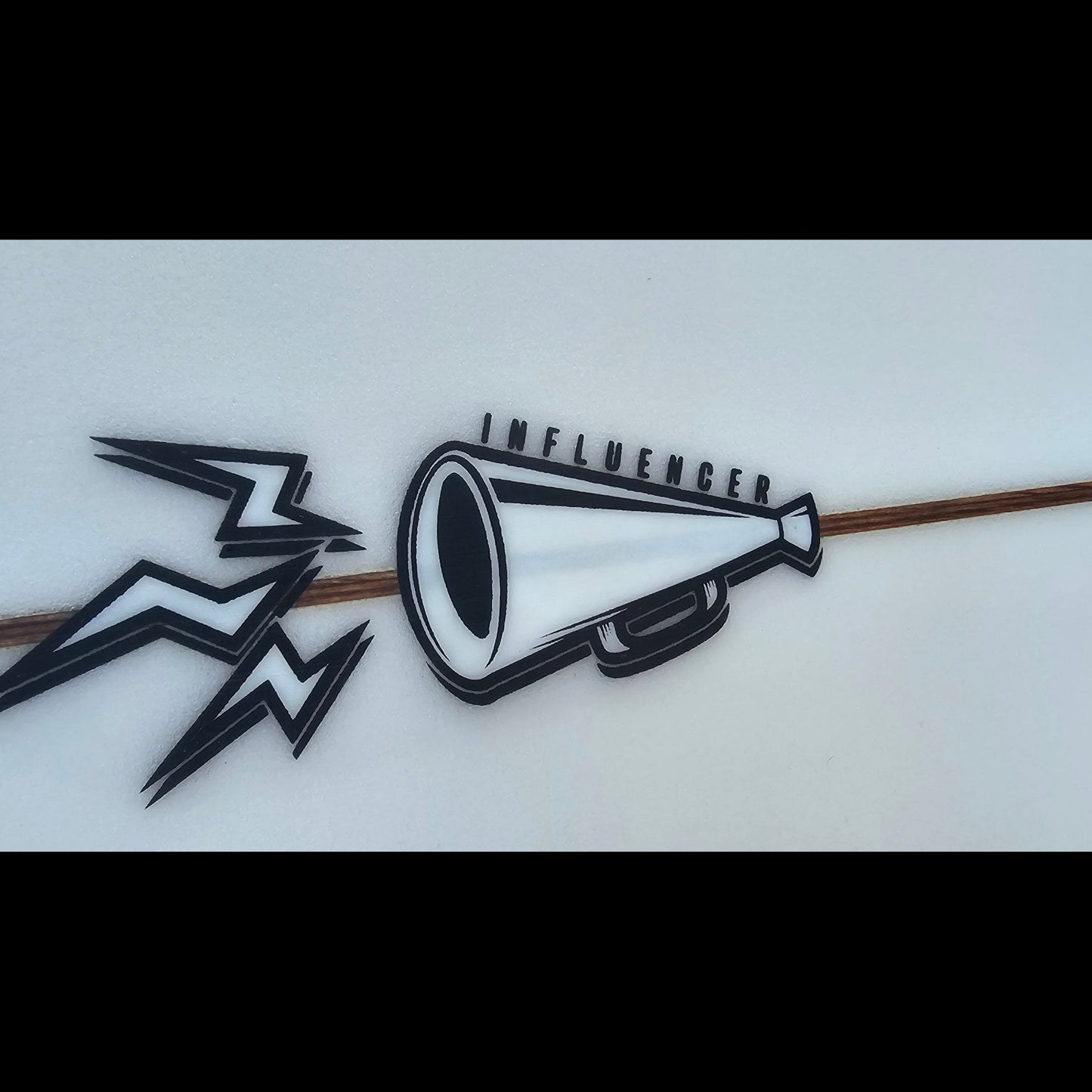 Black and white graphic design with a megaphone and lightning bolt on a white background