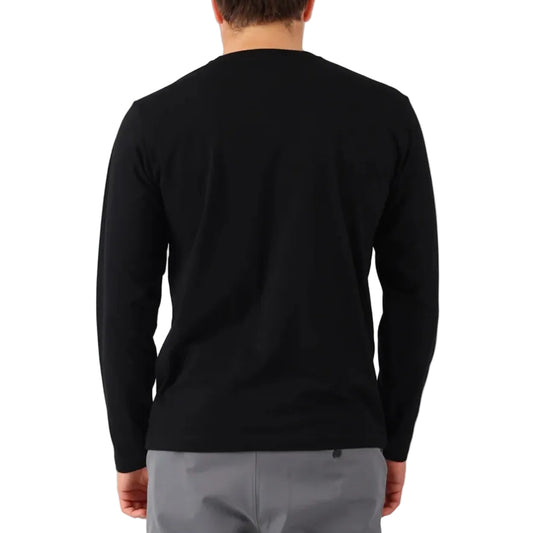 Person wearing a black long-sleeve shirt on a white background
