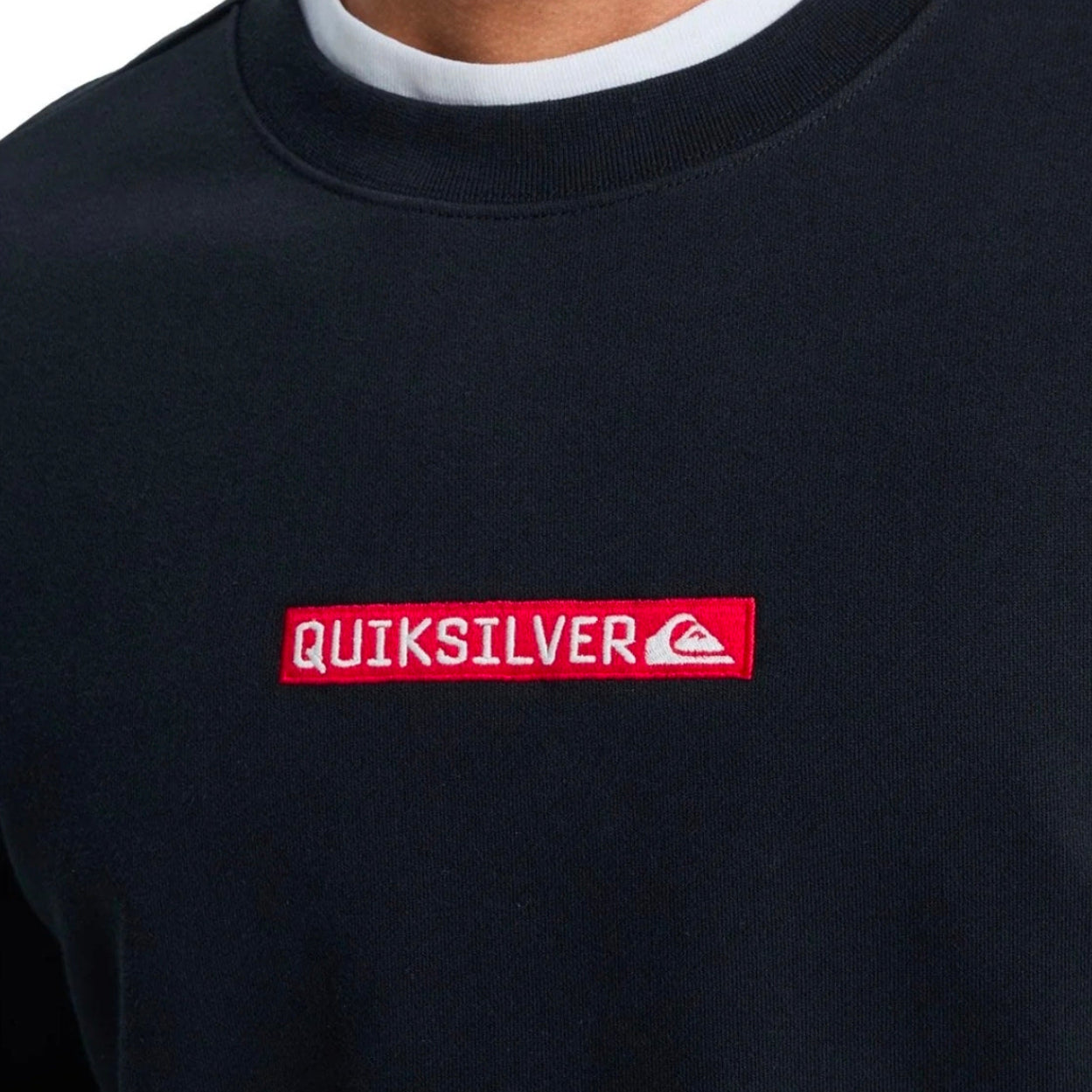 Black sweatshirt with a red and white Quiksilver logo