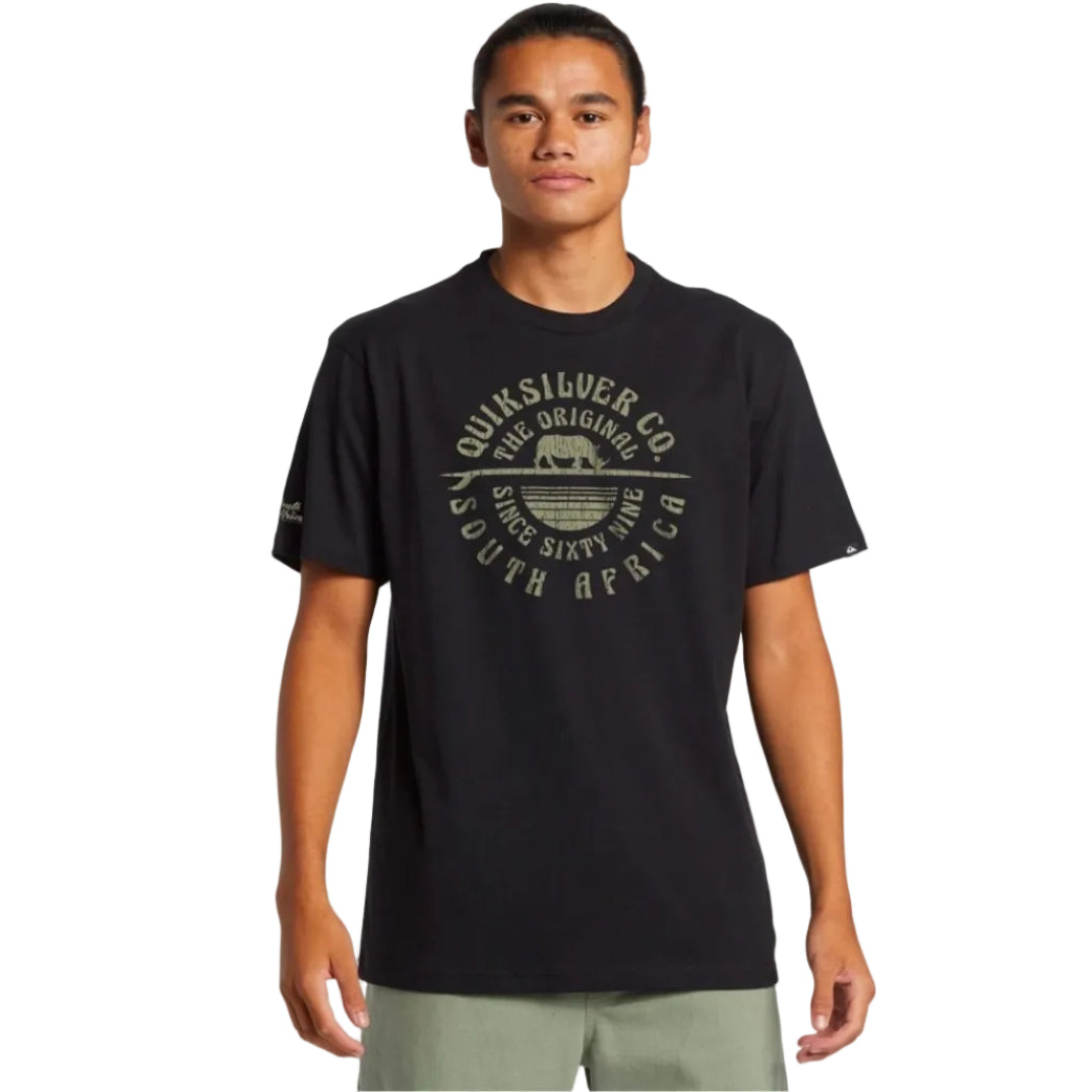 Person wearing a black Quiksilver t-shirt with branding on a white background