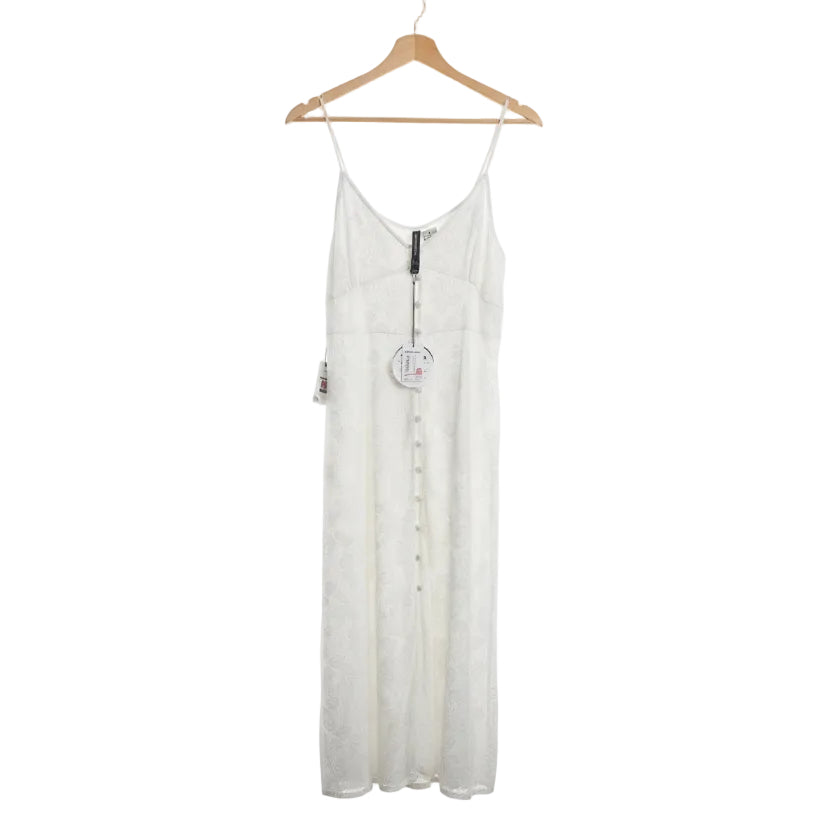 White dress on a hanger against a white background