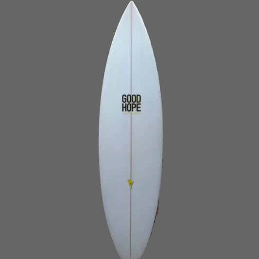 White surfboard with 'Good Hope' branding against a woven mat background