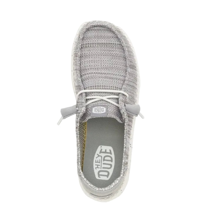 Gray knit shoe with white laces on a white background