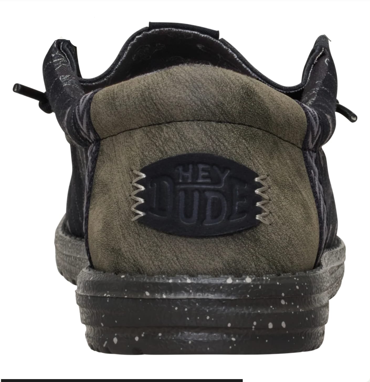 Green sneaker with 'Hey Dude' logo on a white background