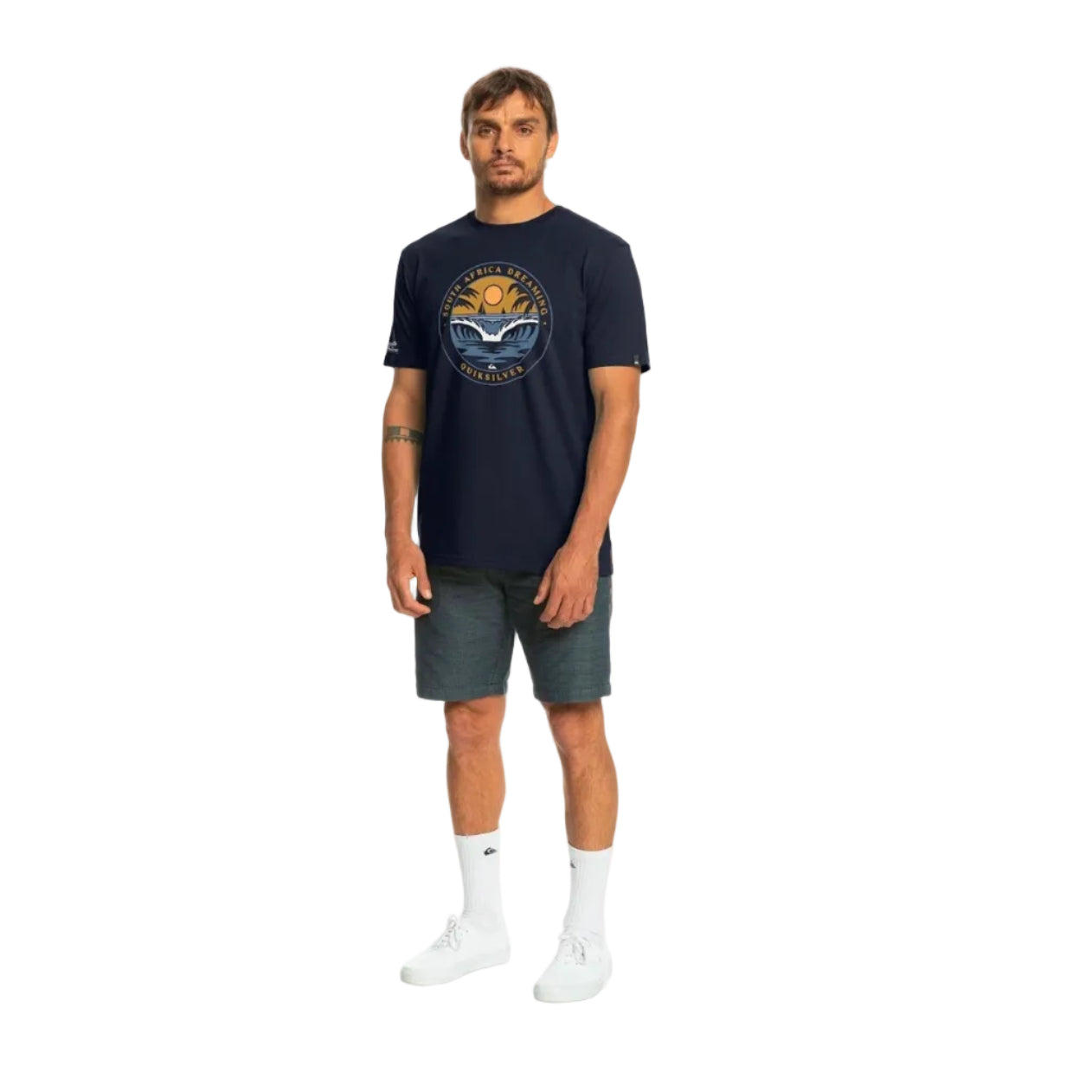 Man wearing a navy blue t-shirt with a graphic design on a white background