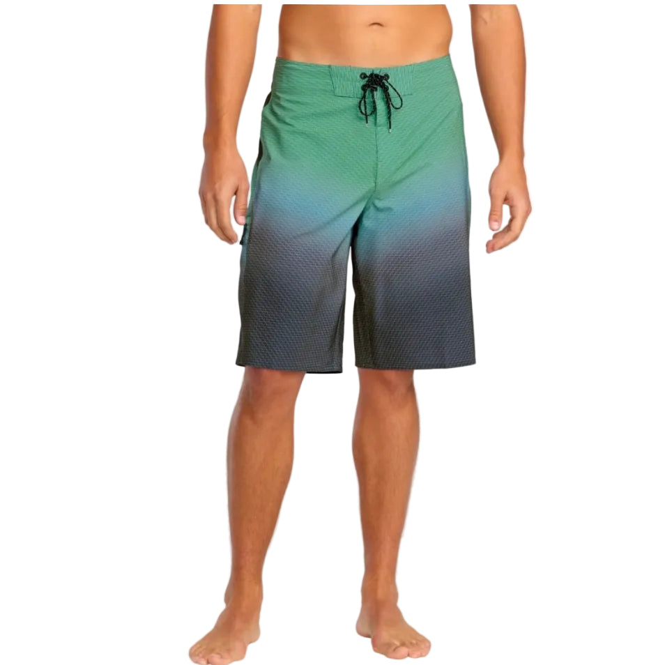 Green and blue gradient shorts worn by a person on a white background