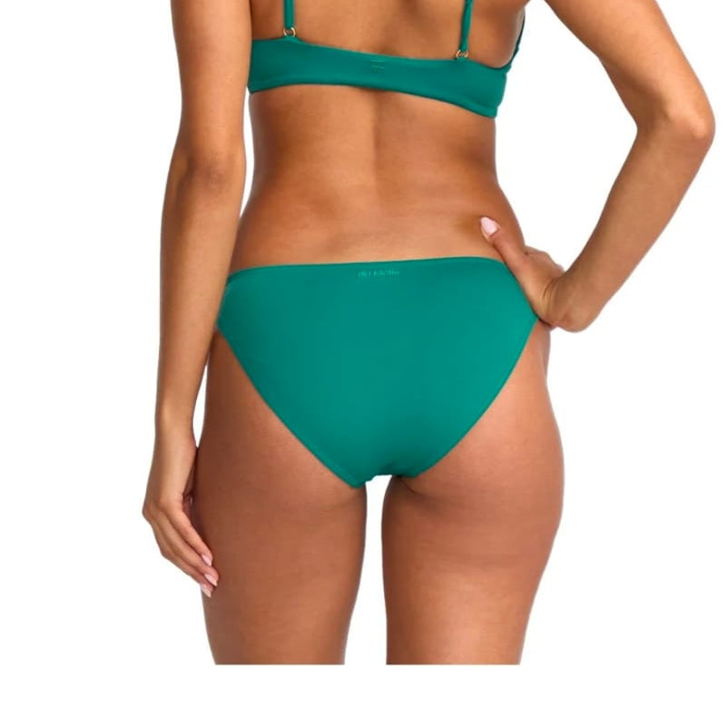 Green bikini set on a model against a white background