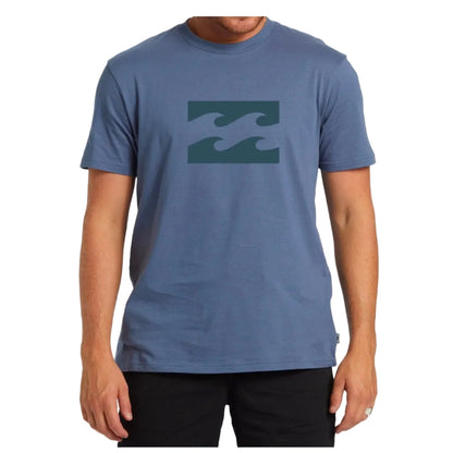 Person wearing a blue t-shirt with a logo on a white background