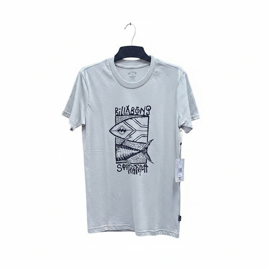 White t-shirt with black graphic design on a hanger against a geometric-patterned wall.