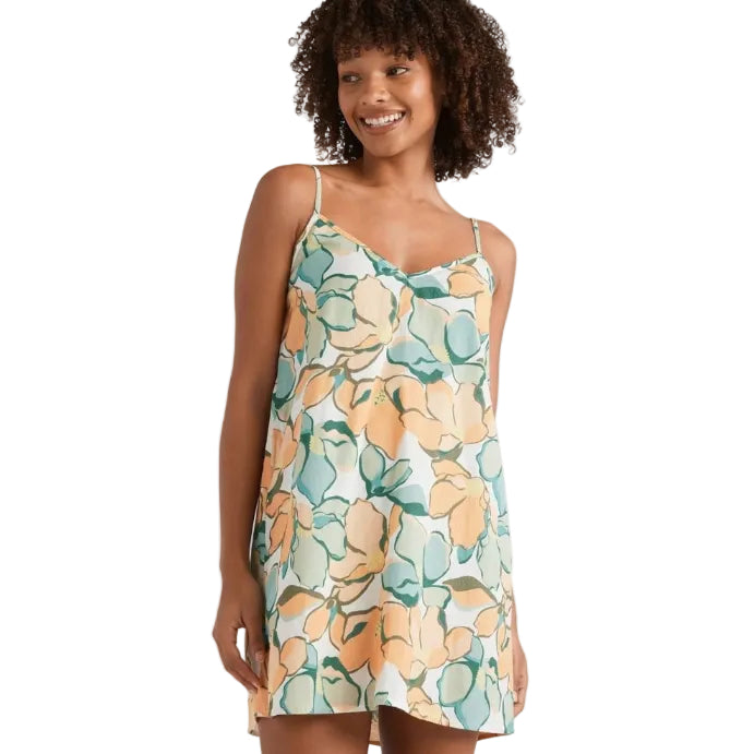 Woman wearing a floral dress on a white background