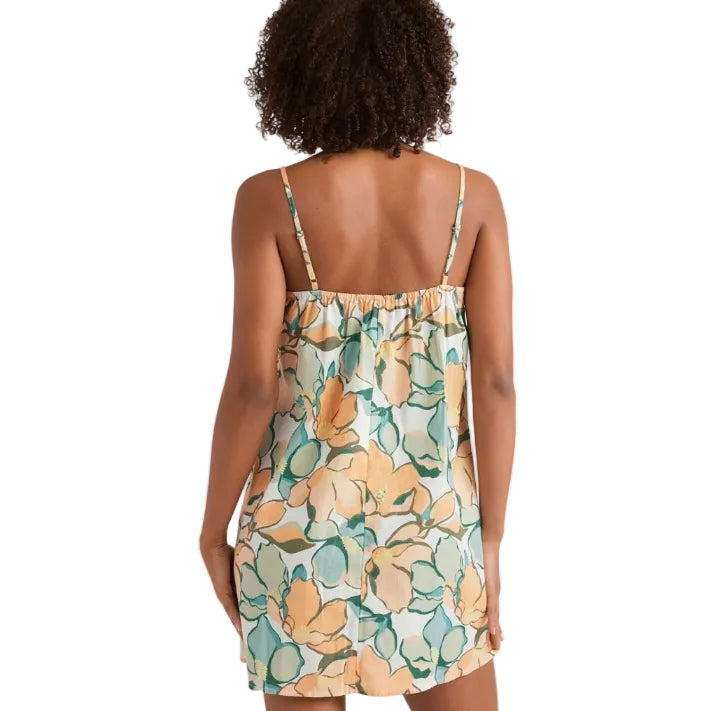 Woman wearing a floral dress with a white background
