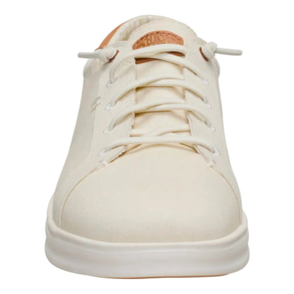 White sneaker with brown accents on a white background