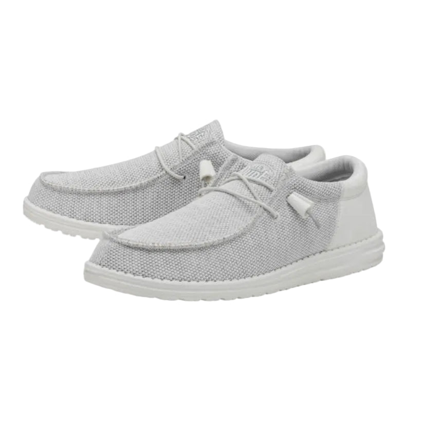 Gray casual shoes with white soles on a white background