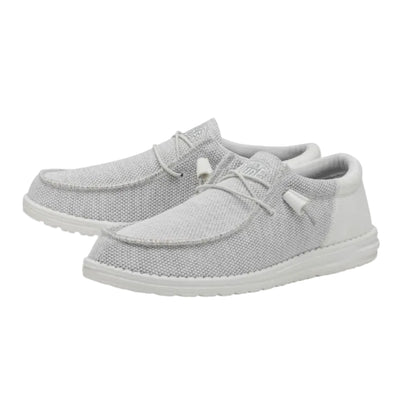Gray casual shoes with white soles on a white background