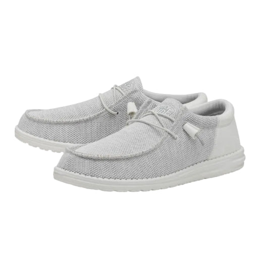 Gray casual shoes with white soles on a white background