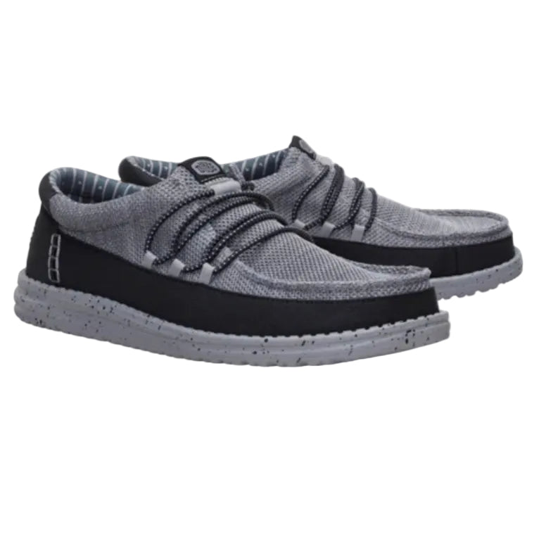 Pair of gray and black shoes on a white background