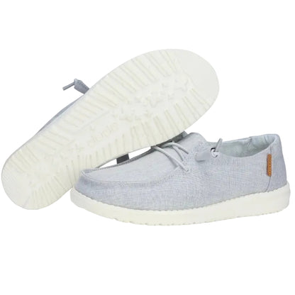 Gray sneakers with white soles on a white background