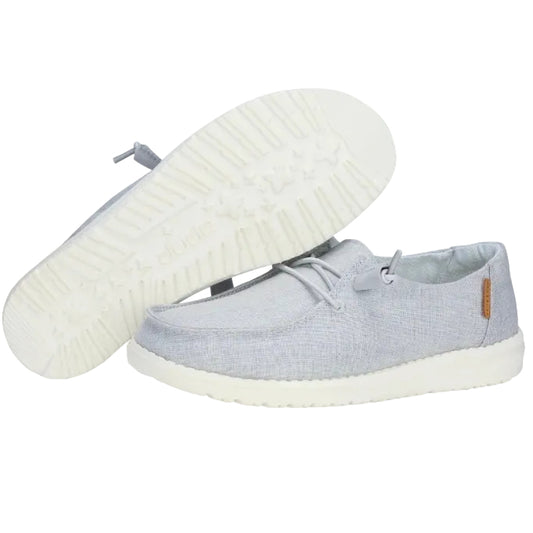 Gray sneakers with white soles on a white background