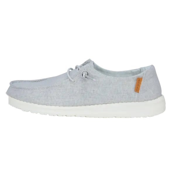 Gray casual shoe with a white sole on a white background