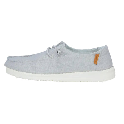 Gray casual shoe with a white sole on a white background