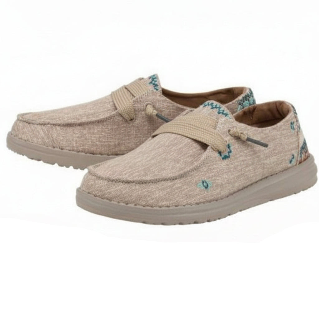 Pair of beige loafers with blue accents on a white background
