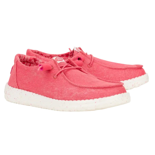 Pink sneakers with white soles on a white background