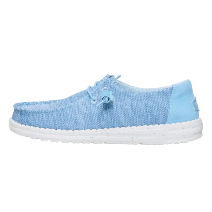 Light blue sneaker with white sole on a white background
