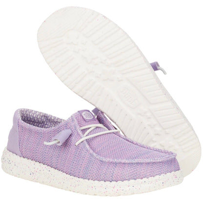 Purple shoe with white sole on a white background