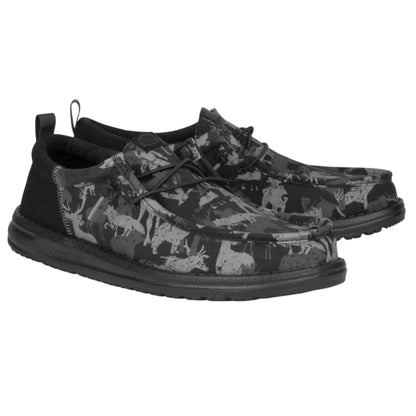 Black and gray patterned shoes on a white background