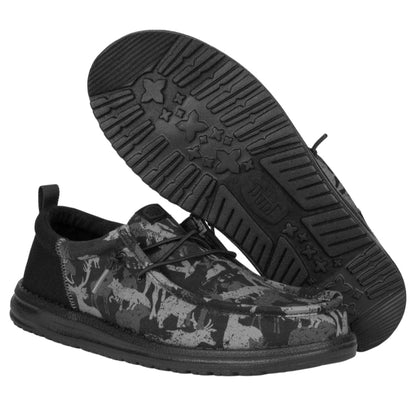 Black and gray camouflage shoes with black soles on a white background