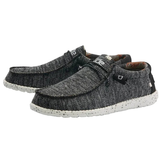 Pair of gray and black textured shoes on a white background
