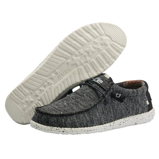 Gray slip-on shoes with white sole on a white background