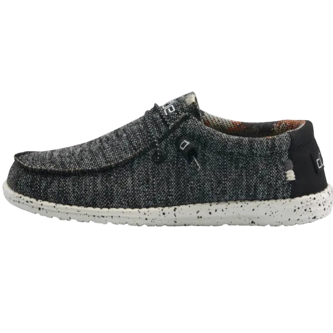 Black and gray textured shoe on a white background