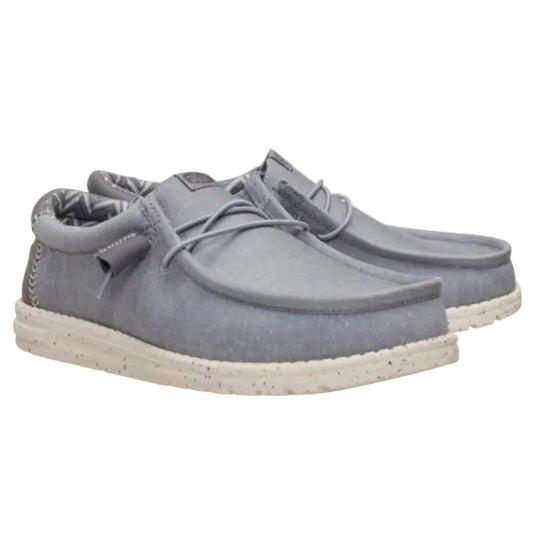 Pair of gray loafers on a white background