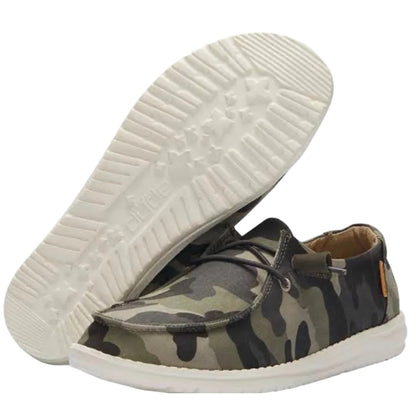 Camouflage-patterned shoes with white soles on a white background