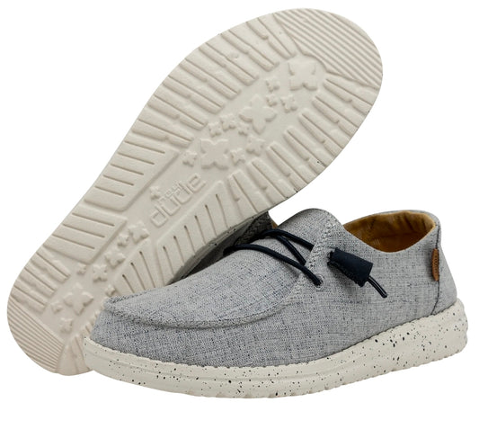 Gray casual shoes with white soles on a white background