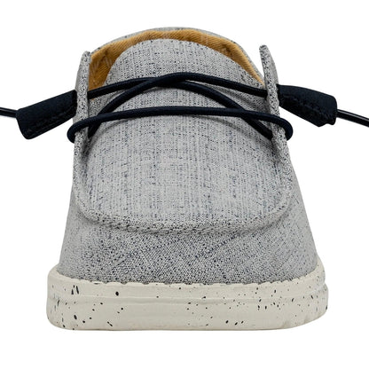 Gray shoe with white sole on a white background