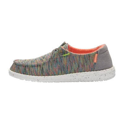 Multicolored knit shoe with gray sole on a white background