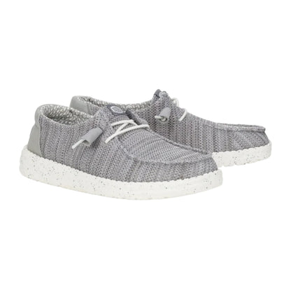 Gray sneakers with white soles on a white background