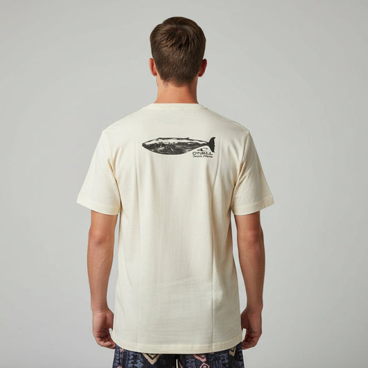 Man wearing a beige t-shirt with a fish graphic on the back against a gray background