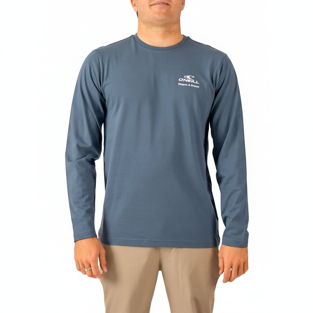 Man wearing a blue long-sleeve shirt with a logo on a white background