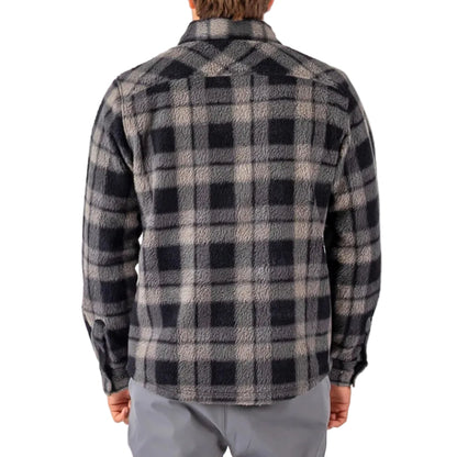 Person wearing a black and gray plaid shirt on a white background