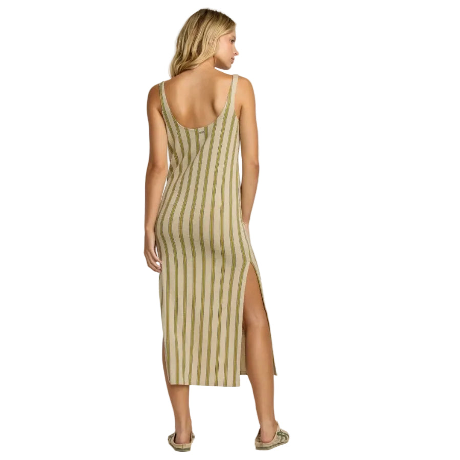 Woman wearing a striped dress with a back view on a white background
