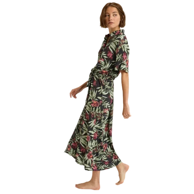 Woman wearing a floral dress on a white background