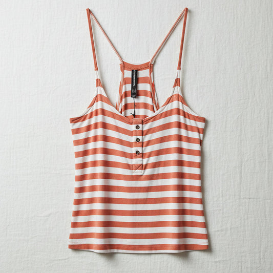 Striped tank top with buttons on a woven surface