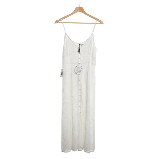White dress on a hanger against a white background